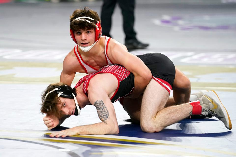 Joey Canova of Bergen Catholic, top, wrestles David DiPietro of Kingsway in a 138-pound bout on day one of the NJSIAA state wrestling tournament in Atlantic City on Thursday, March 2, 2023.