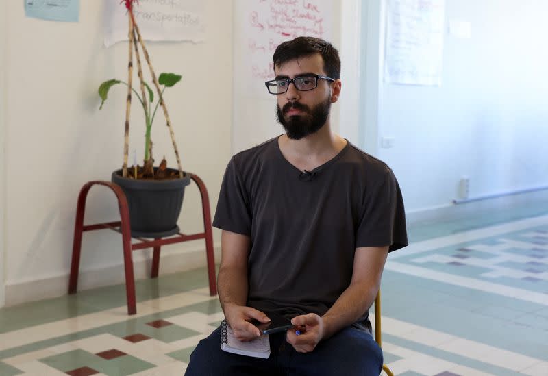 Kareem Nofal, communications specialist at the Anti-Racism Movement, attends an interview with Reuters in Beirut