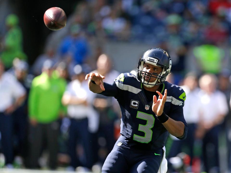 Russell Wilson throws a pass for the Seattle Seahawks.