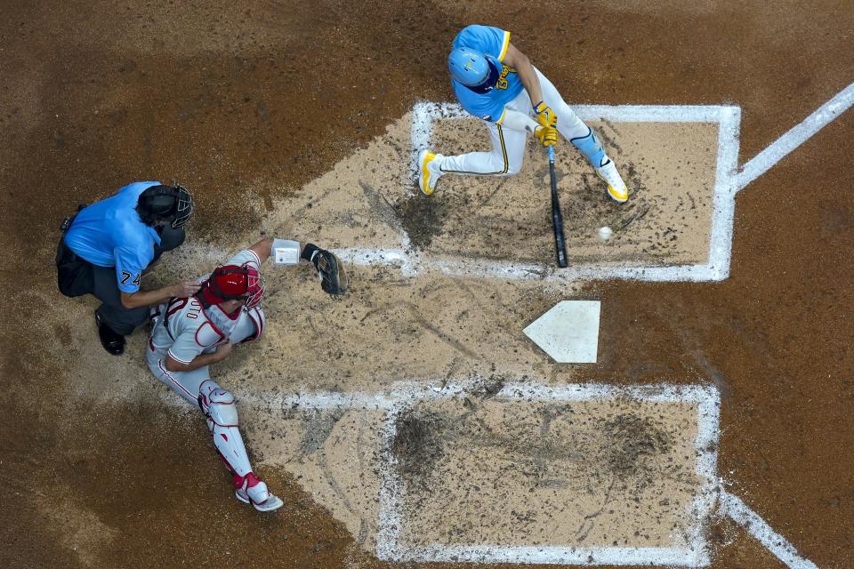 Milwaukee Brewers' Willy Adames hits a three-run home run during the fourth inning of a baseball game against the Philadelphia Phillies Friday, Sept. 1, 2023, in Milwaukee. (AP Photo/Morry Gash)