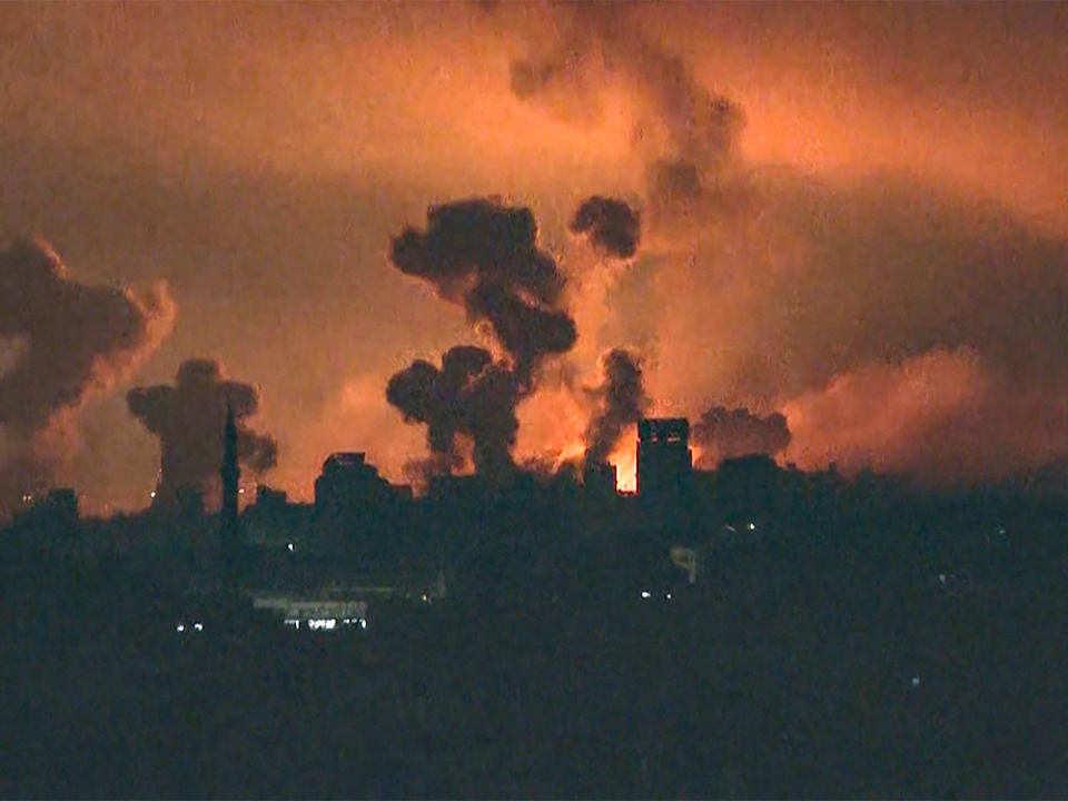  This image grab from AFP TV footage shows fire and smoke rising above Gaza City during an Israeli strike on Oct. 27.