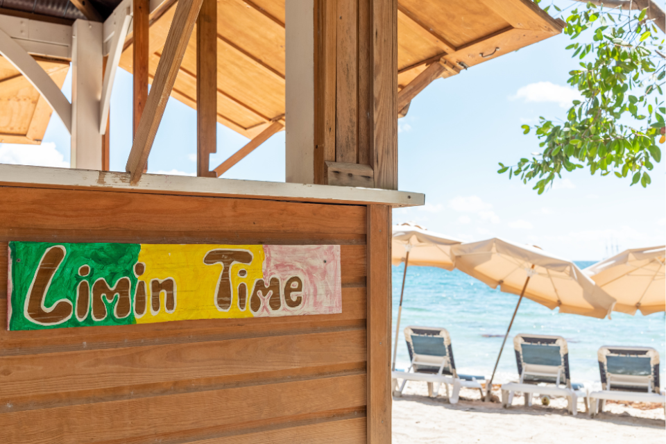 a sign on a beach