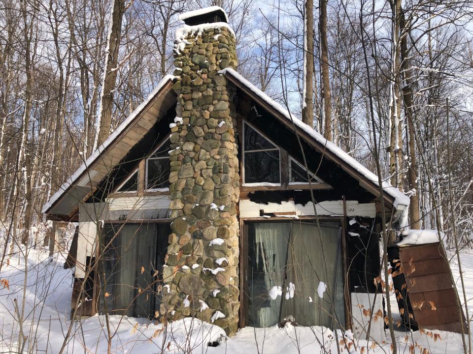 Johanna Simpson built the stone fireplace in this cabin that she and her husband owned, now part of Love Creek County Park in Berrien Center, as seen on Dec. 27, 2022. It is due to become a picnic shelter.