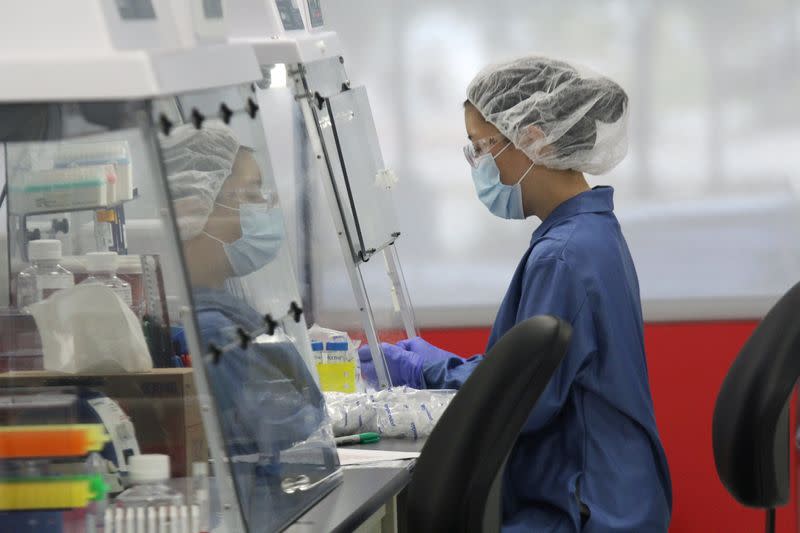 FILE PHOTO: A lab technician works in the lab at Visby Medical in California