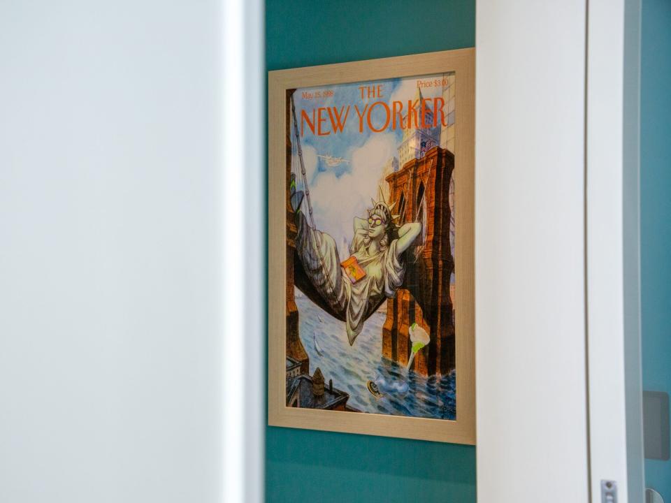 A New Yorker cover with a Margaritaville twist inside the bathroom