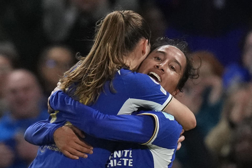 Chelsea's Mayra Ramirez, right, celebrates after scores her side's first goal during the Women's Champions League quarterfinal second leg soccer match between Chelsea and Ajax at Stamford Bridge Stadium in London, Wednesday, March 27, 2024. (AP Photo/Kirsty Wigglesworth)