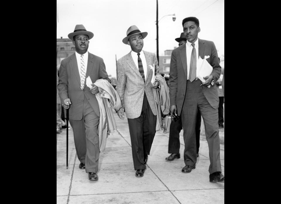 The Rev. Ralph Abernathy, left, Rev. Dr. Martin Luther King, Jr., center, and Bayard Rustin, leaders in the racial bus boycott in Montgomery, Ala., leave the Montgomery County Courthouse on Feb. 24, 1956.  The civil rights leaders were arraigned along with 87 other black activists.  Thousands of supporters walked in protest against the mass indictments and arrests.  (AP)