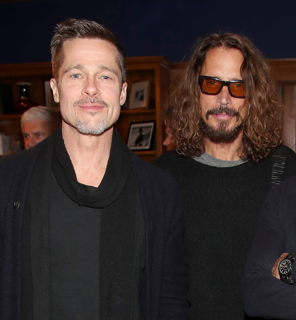 Brad Pitt, pictured with Chris Cornell at the EBMRF Benefit on January 14, has been doting on the late singer's children as they deal with the family tragedy. (Photo: Randy Shropshire/Getty Images for EBMRF)