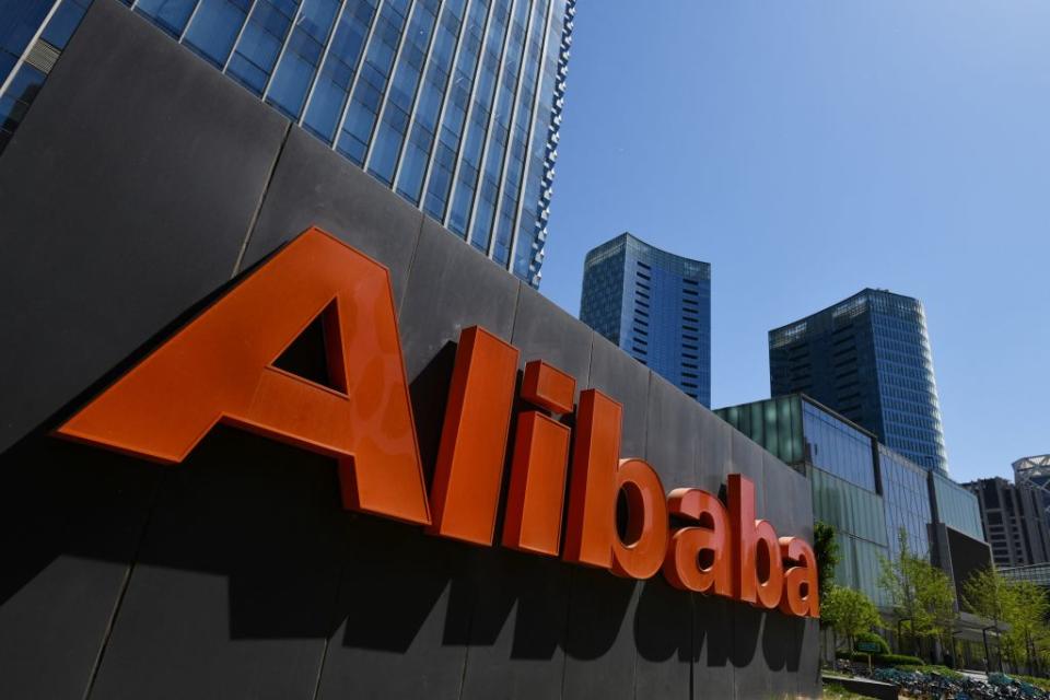 An Alibaba sign is seen outside the company's office in Beijing.