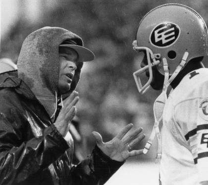 Edmonton Eskimos head coach Hugh Campbell talks with quarterback Warren Moon during the 1982 Grey Cup against the Toronto Argonauts in Toronto on Nov. 28.  The Canadian Press