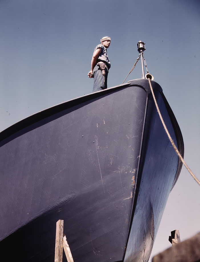 <p>The pictures, showing volunteers taking part in the US war preparations, have been restored in colour for the first time. </p>