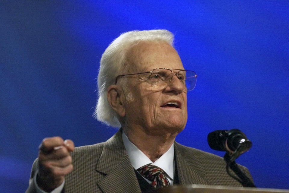 FILE - The Rev. Billy Graham addresses a gathering of about 40,000 people at Bulldog Stadium at Fresno State University in Fresno, Calif., Thursday, Oct. 11, 2001. A statue of the late Rev. Billy Graham set to stand inside the U.S. Capitol to represent North Carolina will be unveiled next week in a ceremony. (Mark Crosse/The Fresno Bee via AP, File)