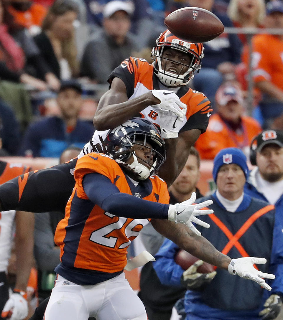 <p>Denver Broncos free safety Bradley Roby (29) breaks up a pass intended for Cincinnati Bengals wide receiver Cody Core during the first half of an NFL football game, Sunday, Nov. 19, 2017, in Denver. (AP Photo/Jack Dempsey) </p>