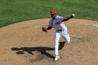 Cincinnati Reds' Reiver Sanmartin throws during the fifth inning of a baseball game against the Pittsburgh Pirates in Cincinnati, Monday, Sept. 27, 2021. (AP Photo/Aaron Doster)