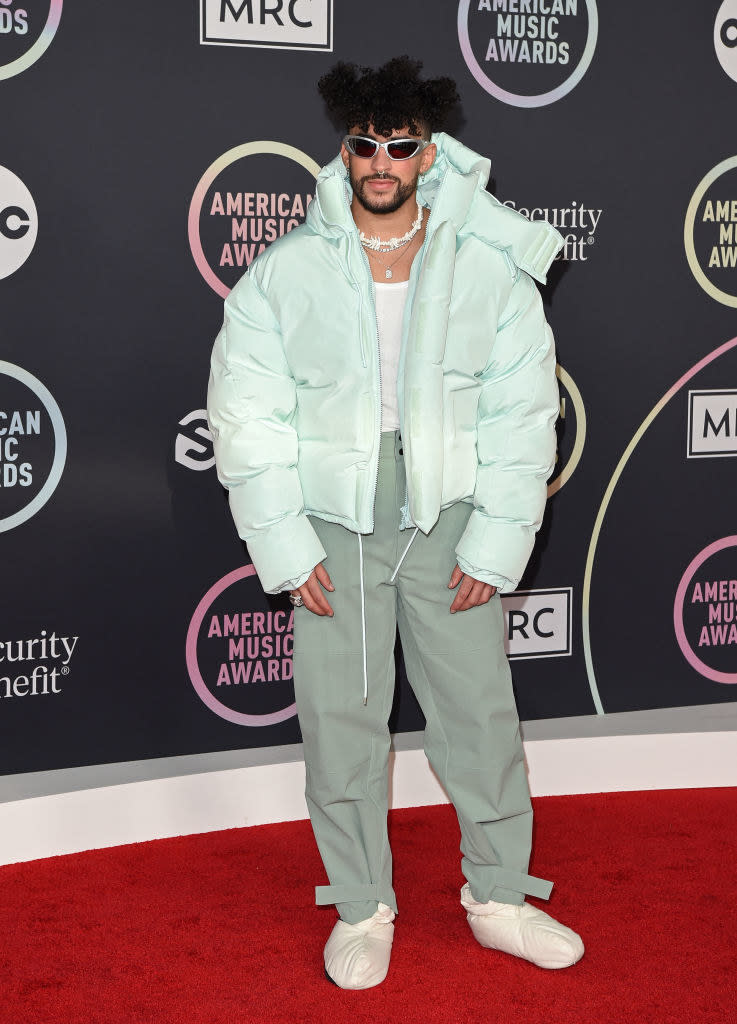 Bad Bunny in a puffer jacket and matching pants