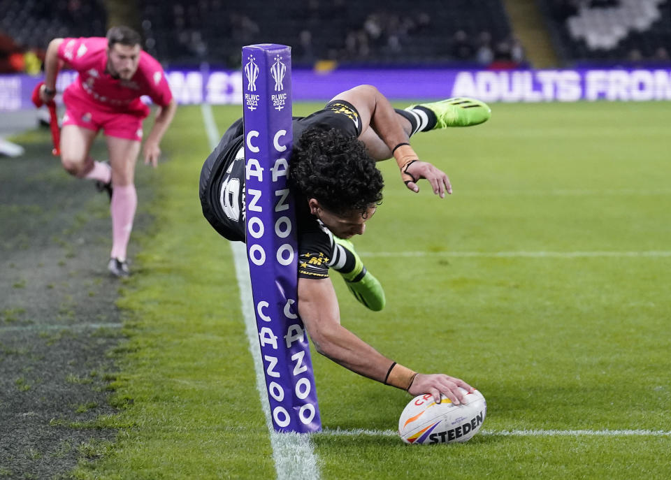 New Zealand's Dallin Watene-Zelezniak scores their side's eleventh try during the Rugby League World Cup group C match between New Zealand and Jamaica at the MKM Stadium, Kingston upon Hull, England, Saturday Oct. 22, 2022. (Danny Lawson/PA via AP)