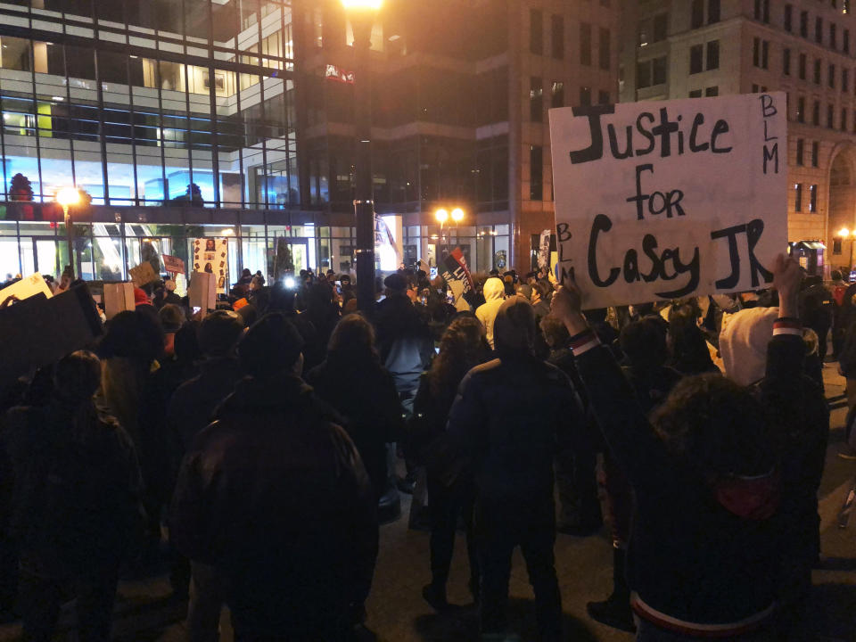 Hundreds of marchers gather in downtown Columbus to protest the Dec. 4 fatal shooting of Casey Goodson Jr., who was Black, by a white Ohio sheriff's deputy, on Friday, Dec. 11, 2020, in Columbus, Ohio. Protests were planned Friday and Saturday over the death of Goodson. (AP Photo/Andrew Welsh-Huggins)