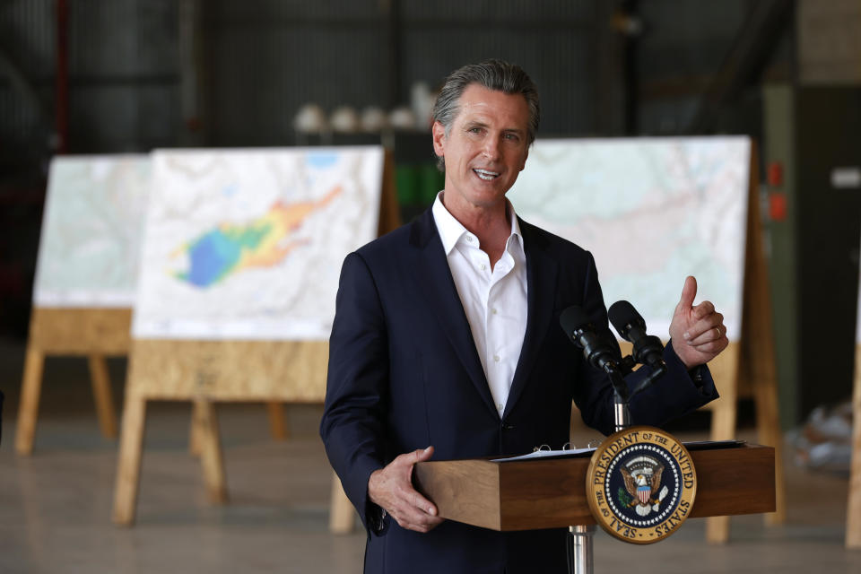 California Governor Gavin Newsom delivers remarks to reporters after a helicopter tour of the Caldor Fire region with President Biden at Mather Airport on Monday, September 13, 2021, in Mather, California. / Credit: Justin Sullivan / Getty Images
