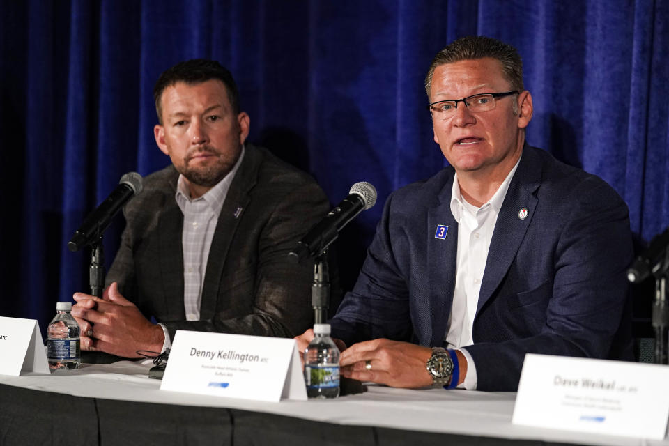 Buffalo Bills head athletic trainer Nate Breske, left, and associate head athletic trainer Denny Kellington, described their experience when Damar Hamlin suffered a cardiac arrest during an NFL football game in January, during a panel discussion at the National Athletic Trainers' Association meeting in Indianapolis, Thursday, June 22, 2023. Breske and Kellington say they stuck to their pre-planned treatment plan and now they're encouraging schools and youth leagues to also make their own potentially life-saving plans. (AP Photo/Michael Conroy)