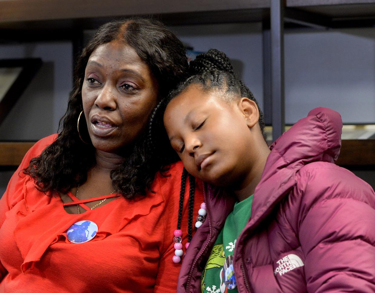 Rosena Washington, left, and Astarr Wright, talk about Earl Moore Jr. during a press conference at the NAACP Building in Springfield Thursday, Dec 14, 2023. The one-year anniversary of Moore's death is Monday. Washington is Moore's mother and Wright is Moore's niece.