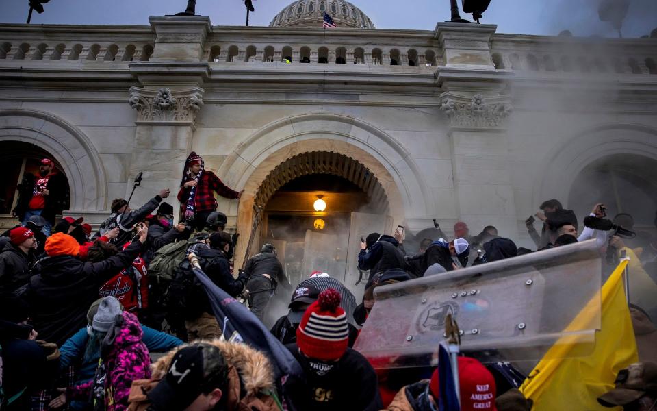 Demonstrators breached security and entered the Capitol as Congress debated the 2020 presidential election Electoral Vote Certification