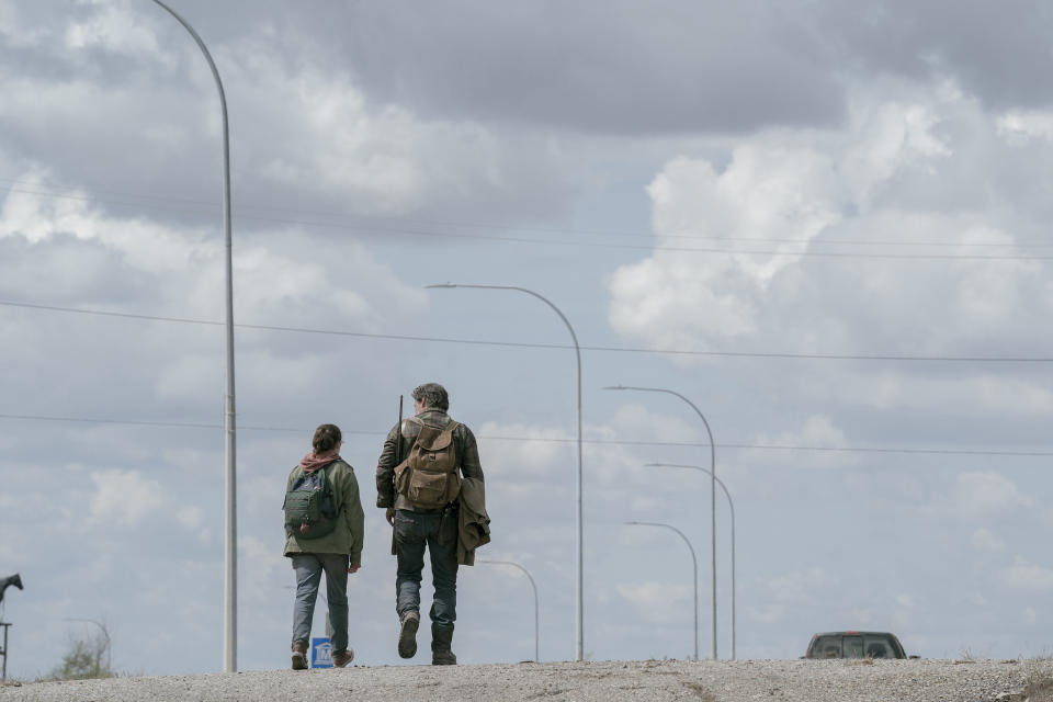 This image released by HBO shows Bella Ramsey, left, and Pedro Pascal in a scene from the series "The Last of Us." (HBO via AP)