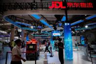 An autonomous delivery robot is displayed at the booth of JD Logistics, the delivery arm of JD.com, during World Robot Conference 2021 in Beijing