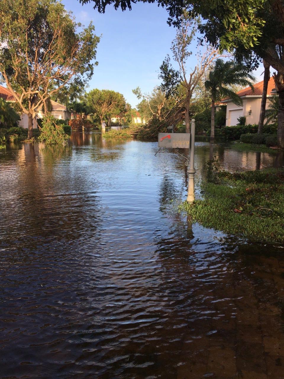 Flood waters left in the wake of Hurricane Irma in 2017 filled the roads near the Bonita Springs Golf and Country Club.