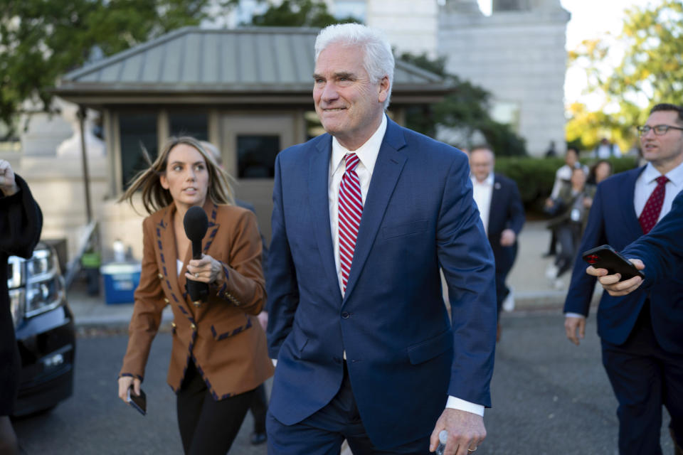 House Majority Whip Rep. Tom Emmer, R-Minn., followed by reporters, leaves the Republican caucus meeting at the Capitol in Washington, Tuesday, Oct. 24, 2023, after withdrawing as Republican nominee for House speaker, becoming the third candidate to fall short. (AP Photo/Jose Luis Magana)