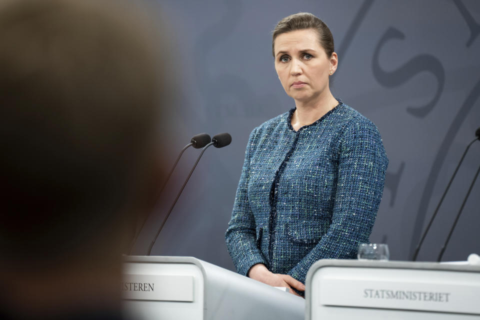 Danish Prime Minister Mette Frederiksen speaks to the media during a press conference in Copenhagen, Sunday March 6, 2022. (Emil Helms/Ritzau Scanpix via AP)