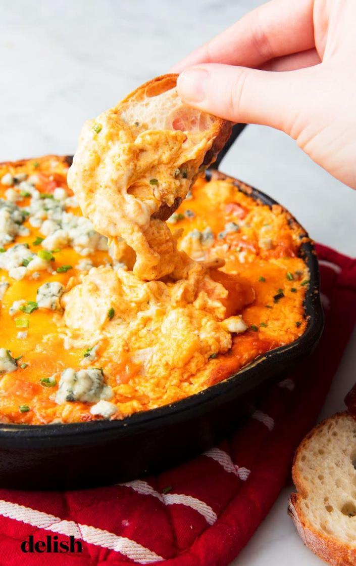 <p>Dip crackers, sliced french bread, and even apple slices into this gooey bleu cheese buffalo chicken dip that is so delicious it's addicting.</p><p><em><strong>Get the recipe at <a href="https://www.delish.com/cooking/recipe-ideas/a44551/buffalo-chicken-dip-in-a-bread-bowl-recipe/" rel="nofollow noopener" target="_blank" data-ylk="slk:Delish" class="link rapid-noclick-resp">Delish</a>.</strong></em></p>