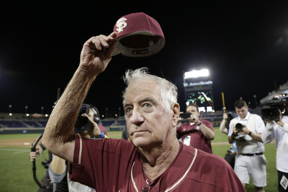 FILE - Florida State coach Mike Martin tips his hat to spectators following the team's NCAA College World Series baseball game against Texas Tech in Omaha, Neb., June 19, 2019. Mike Martin, a member of the College Baseball Hall of Fame who won an NCAA Division I record 2,029 games in 40 seasons as Florida State’s baseball coach, died Thursday, Feb. 1, 2024, after a three-year battle with dementia. He was 79. (AP Photo/Nati Harnik, File)