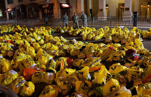 Unclaimed finish line bags are viewed near the scene of a twin bombing at the Boston Marathon. Picture: Getty