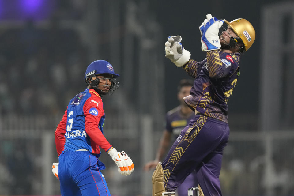 Kolkata Knight Riders' Phil Salt successfully catches the ball to dismiss Delhi Capitals' Kumar Kushagra during the Indian Premier League cricket match between Delhi Capitals and Kolkata Knight Riders in Kolkata, India, Monday, April 29, 2024. (AP Photo/Bikas Das)