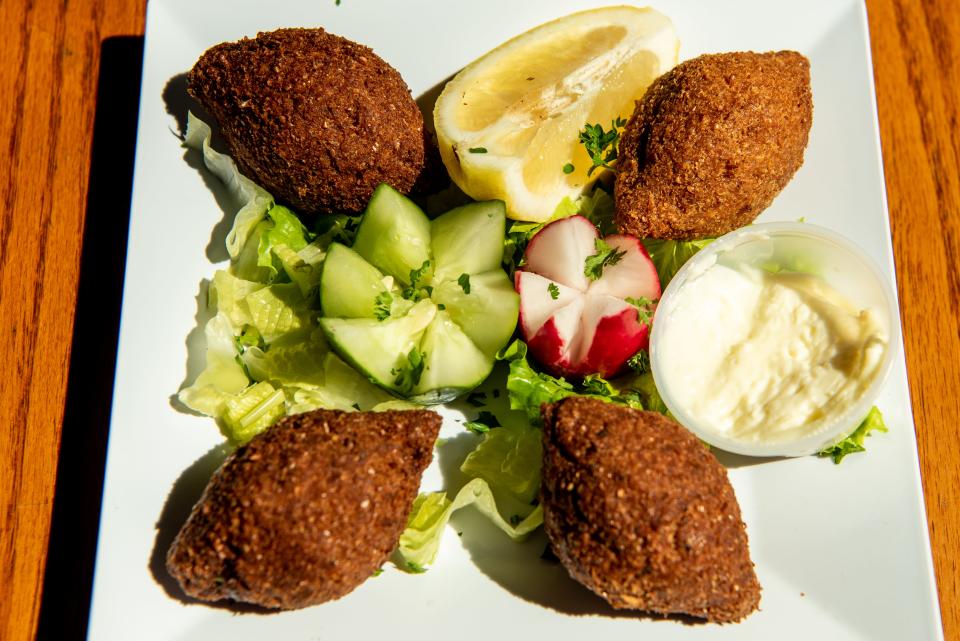 Kibbeh at Palestine Restaurant, formerly known as Saj. It was renamed to capitalize on a new street name: Palestine Way.