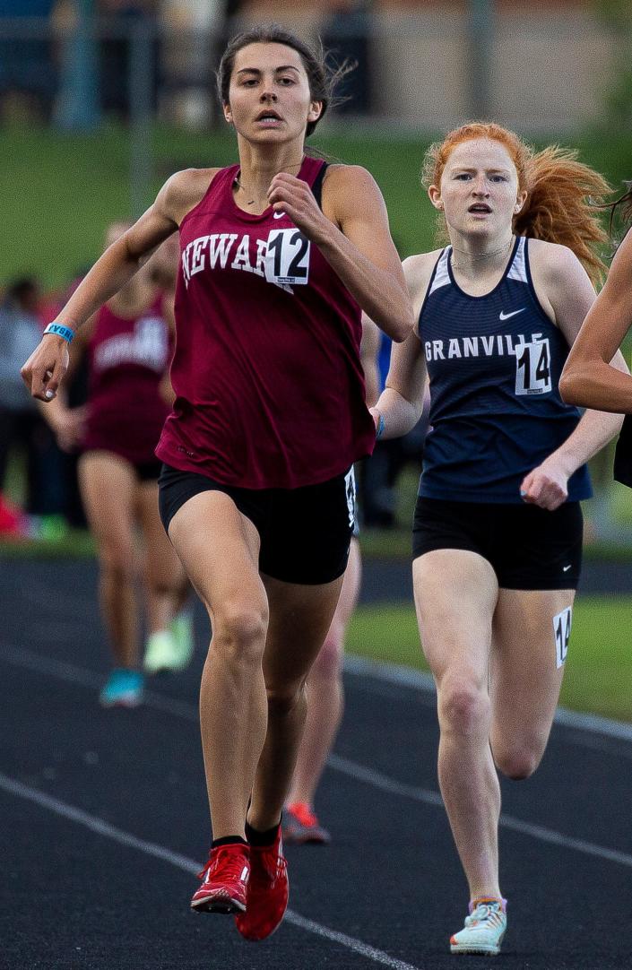 Newark senior Gwen Stare, left, and Granville junior Lillian Eckels charge toward the finish line in the 800 during the Division I regional championships at Pickerington North on Friday, May 27, 2022. Stare placed fourth and Eckels sixth.