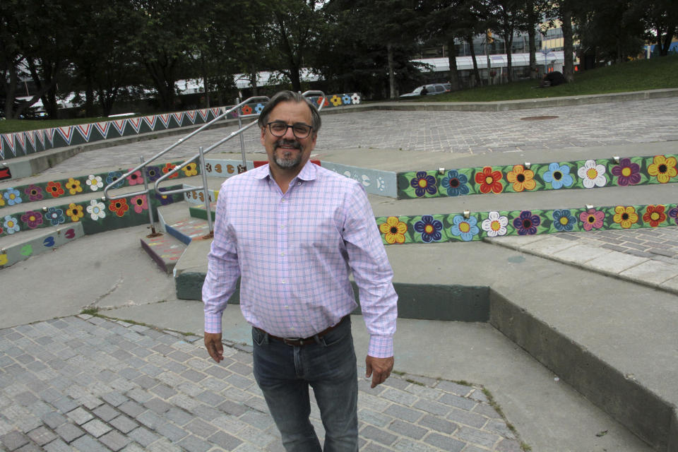 Christopher Constant, the chair of the Anchorage Assembly, poses for a photo in downtown Anchorage, Alaska, on Wednesday, July 26, 2023. Constant said Mayor Dave Bronson's plan to give homeless people a plane ticket out of Anchorage instead of using's the city's sports arena as a shelter this winter is problematic because so many are Alaska Natives and there is nowhere to send them, as Anchorage is their land. (AP Photo/Mark Thiessen)