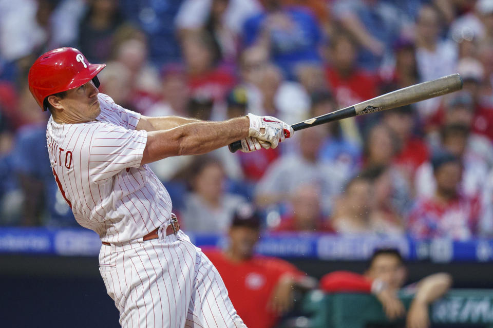 Philadelphia Phillies' J.T. Realmuto hits a two-run home run during the third inning of the team's baseball game against the Washington Nationals, Friday, Aug. 5, 2022, in Philadelphia. (AP Photo/Chris Szagola)