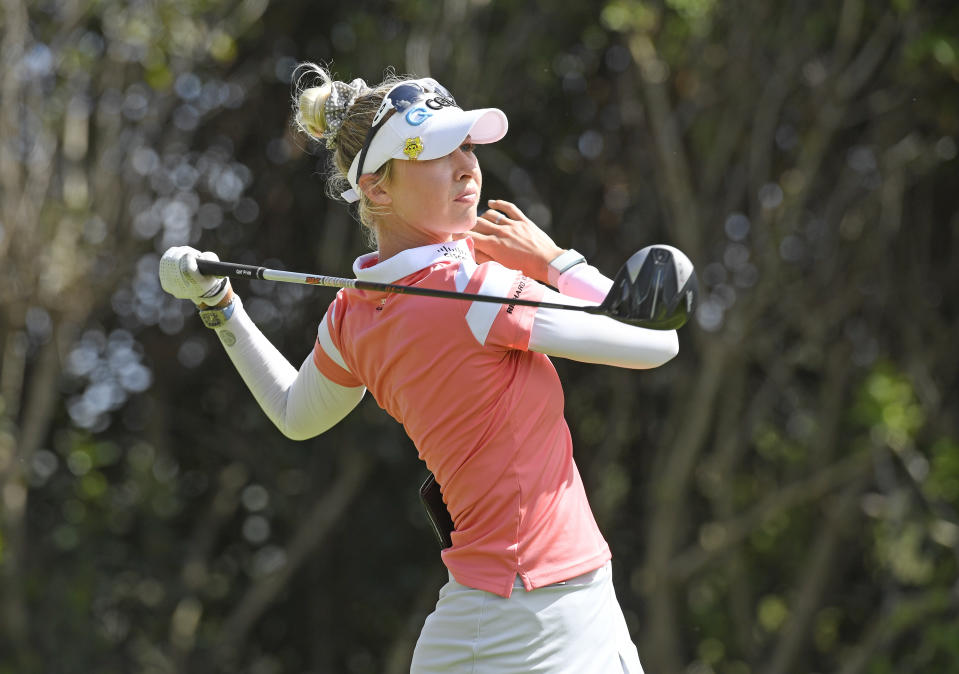 Nelly Korda plays a tee shot on the eighth hole during the final round of the Gainbridge LPGA golf tournament Sunday, Feb. 28, 2021, in Orlando, Fla. (AP Photo/Stan Badz)