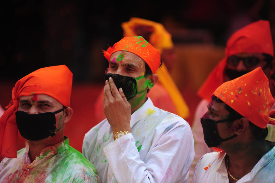 people wearing face mask to prevent from COVID-19 , take part in an event to celebrate the Hindu festival of Holi for the children with cerebral palsy , organised by The Trishla Foundation , in Allahabad on March 6,2020. (Photo by Ritesh Shukla/NurPhoto via Getty Images)