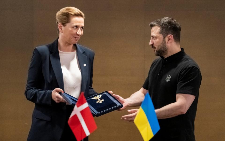 Volodymyr Zelensky awards the Order of Freedom of Ukraine Mette Frederiksen, the  to prime minister of Denmark