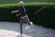 Jun 25, 2017; Cromwell, CT, USA; Jordan Spieth reacts after chipping out of the sand for a birdie during the first playoff hole of the final round of the Travelers Championship golf tournament at TPC River Highlands. Bill Streicher-USA TODAY Sports