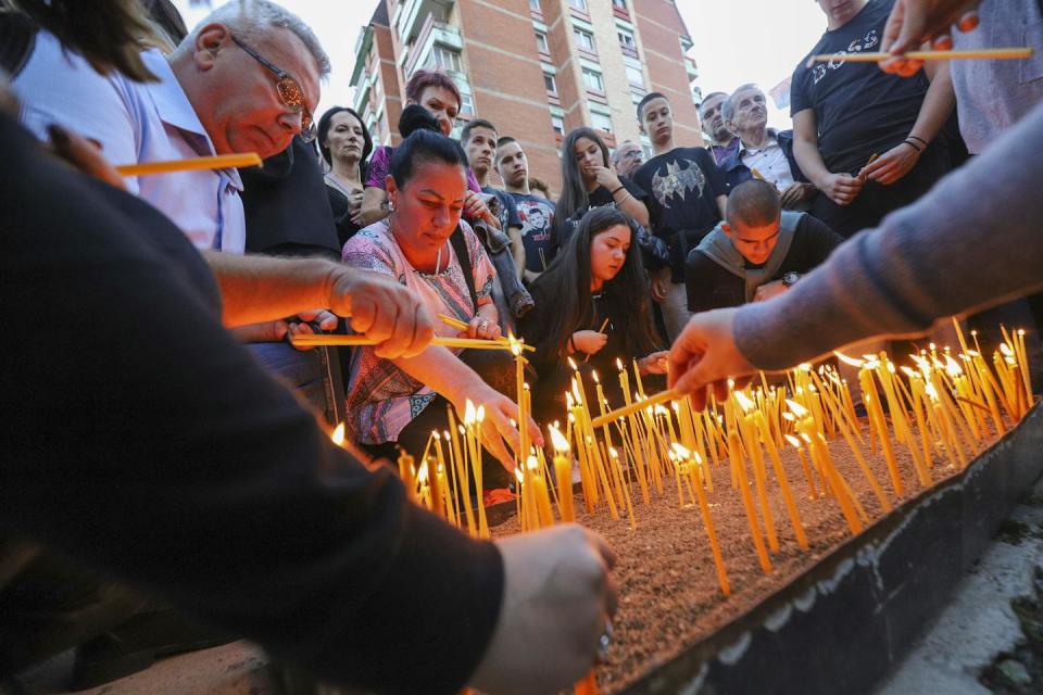 Candles for three killed Serbs in the northern Serb-dominated part of the ethnically divided town of Mitrovica, Kosovo, Sept. 26, 2023. <a href="https://newsroom.ap.org/detail/KosovoSerbiaShootout/99c7b994087c4ba7ac7543d03e180b4b/photo?Query=armed%20attack%20serbia&mediaType=photo&sortBy=arrivaldatetime:desc&dateRange=Anytime&totalCount=33&currentItemNo=4" rel="nofollow noopener" target="_blank" data-ylk="slk:AP Photo/Bojan Slavkovic;elm:context_link;itc:0;sec:content-canvas" class="link ">AP Photo/Bojan Slavkovic</a>