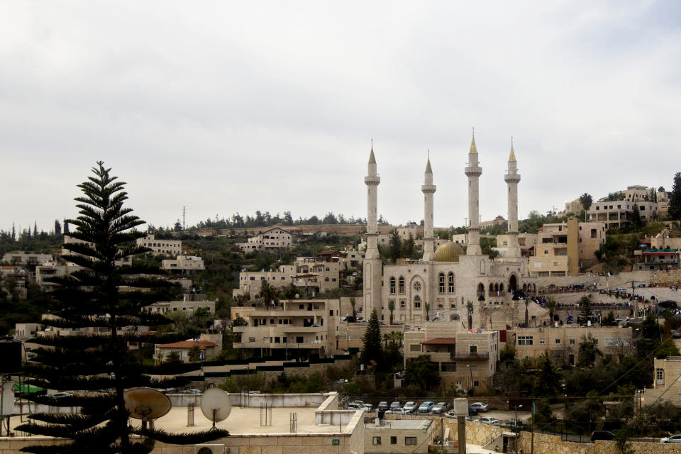 A general view of a new mosque, partially funded by Chechnya, in the Arab village of Abu Ghosh, on the outskirts of Jerusalem, Sunday, March 23, 2014. Isa Jabar, the mayor of the village, says Chechnya donated $6 million for the new mosque and that some Abu Ghosh residents trace their ancestry to 16th century Chechnya and the Caucus region. (AP Photo/Sebastian Scheiner)