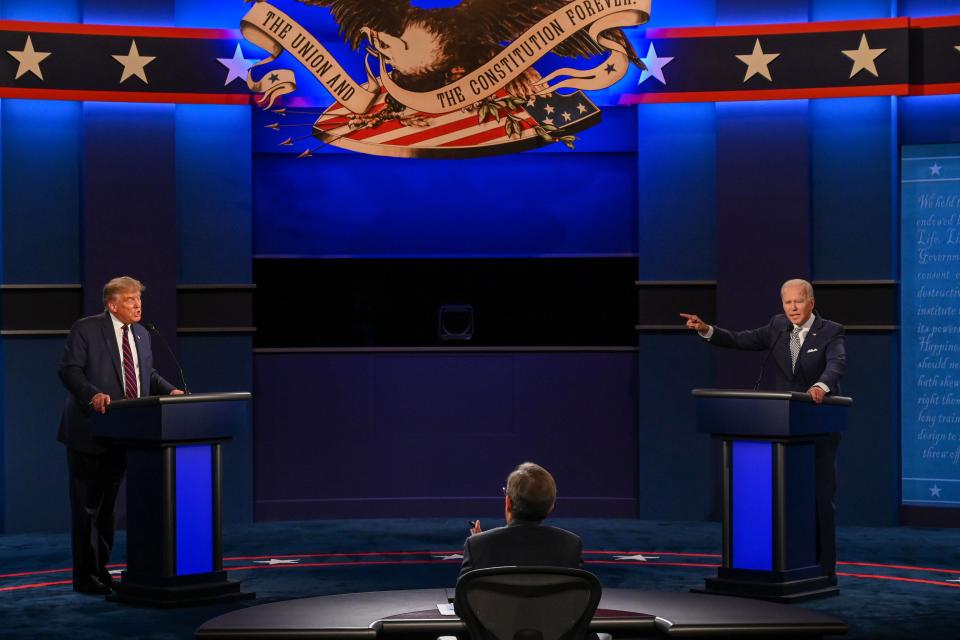 Donald Trump and Joe Biden exchange remarks in a heated televised debate in Ohio on 29 September, 2020. (AFP via Getty Images)