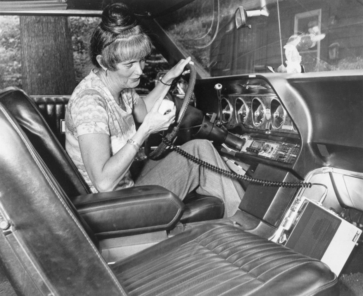 Woman Using CB Radio in Her Car 1977