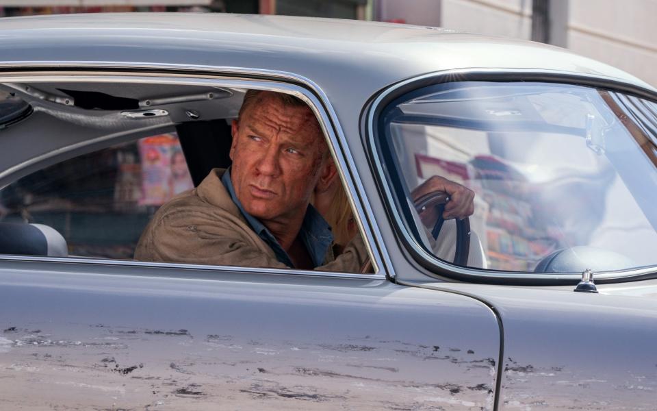 James Bond (Daniel Craig) drives through Matera, Italy, in the new film - Getty 