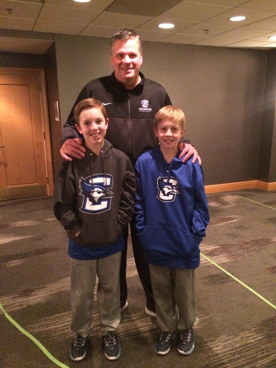 For University of Akron wing Zach Halligan, right, and his brother Ty, it will be a reunion of sorts when the Zips play Creighton in the NCAA Tournament, as this picture with Bluejays coach Greg McDermott shows.