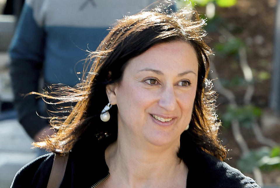 FILE - This April 4, 2016 file photo shows Maltese investigative journalist Daphne Caruana Galizia, who was killed by a car bomb in Malta on Oct. 16, 2017. A former top government aide in Malta, Keith Schembri, who was investigated by Galizia, later killed by a car bomb, on Saturday, March 21, 2021, was arraigned in a Maltese court on charges of money-laundering, fraud and corruption. (AP Photo/Jon Borg, File)