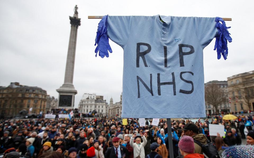 NHS staff march in a protest against vaccine mandates, in London - PETER NICHOLLS 